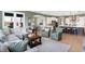 Open concept living room with a view of the kitchen and access to the dining area at 12594 Tidecrest Dr, Fishers, IN 46037