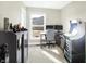 Home office with desk, computer, and arcade game at 12594 Tidecrest Dr, Fishers, IN 46037