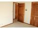 Bedroom with wood doors and carpet at 184 Old North Salem Rd, Danville, IN 46122