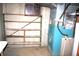 Unfinished basement with shelves and stained glass at 184 Old North Salem Rd, Danville, IN 46122