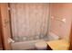 Bathroom with shower/tub combo and seashell shower curtain at 184 Old North Salem Rd, Danville, IN 46122