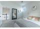 Bright bedroom with large mirror and ensuite bathroom access at 1939 Ponsonby Dr, Westfield, IN 46074