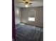 Bright bedroom with ceiling fan and window at 428 N Wyndstone Way, Fortville, IN 46040