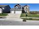 Two-story house with three-car garage and landscaping at 428 N Wyndstone Way, Fortville, IN 46040