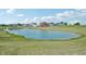 View of a pond with houses in the background at 5759 Cr W 750 N, McCordsville, IN 46055