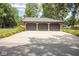 Three-car garage with large driveway at 2212 Larita Ln, Anderson, IN 46017