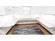 Home office with built-in desk and wood floors at 2212 Larita Ln, Anderson, IN 46017
