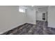 Spacious basement bedroom with new carpet and mirrored closet doors at 1208 W 18Th St, Indianapolis, IN 46202