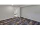 Finished basement room with new carpeting and neutral paint at 1208 W 18Th St, Indianapolis, IN 46202