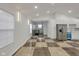 Modern kitchen with stainless steel appliances and checkered floor at 1208 W 18Th St, Indianapolis, IN 46202