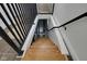 Modern staircase with wood steps and metal railing at 1208 W 18Th St, Indianapolis, IN 46202