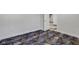 Bright basement bedroom with new carpet and access to other rooms at 1208 W 18Th St, Indianapolis, IN 46202