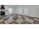 Modern kitchen with stainless steel appliances and checkered floor at 1208 W 18Th St, Indianapolis, IN 46202