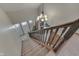 Elegant staircase with dark wood railing leading to the upper level at 6971 Lynx Dr, Nineveh, IN 46164