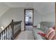 Upper level landing with comfortable couch and view of bedroom at 6971 Lynx Dr, Nineveh, IN 46164