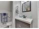 Small bathroom with dark vanity and updated fixtures at 6971 Lynx Dr, Nineveh, IN 46164