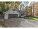 Gray house with gray shutters, a two-car garage and a gravel driveway at 6971 Lynx Dr, Nineveh, IN 46164