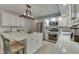 Modern kitchen with stainless steel appliances and white cabinets at 6971 Lynx Dr, Nineveh, IN 46164