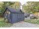 Decorated storage shed next to the house; fall decor is visible at 6971 Lynx Dr, Nineveh, IN 46164