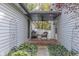 Brick patio with seating area and lush landscaping at 6971 Lynx Dr, Nineveh, IN 46164