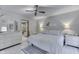 Main bedroom with en-suite bathroom and striped bedding at 6971 Lynx Dr, Nineveh, IN 46164