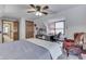 Bright bedroom featuring a large bed and built-in workspace at 6971 Lynx Dr, Nineveh, IN 46164