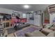 Multipurpose basement with gym equipment, kitchenette, and seating area at 6971 Lynx Dr, Nineveh, IN 46164