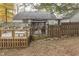 Multi-level deck with seating area and fenced yard at 6971 Lynx Dr, Nineveh, IN 46164