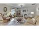 Charming living room with rocking chair and antique cabinet at 6971 Lynx Dr, Nineveh, IN 46164
