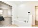 Bathroom with bathtub and walk-in closet at 3518 Heathcliff Ct, Westfield, IN 46074