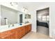 Bathroom with double vanity and bedroom access at 3518 Heathcliff Ct, Westfield, IN 46074