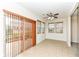 Dining area with tile floor, sliding door to patio and ceiling fan at 3518 Heathcliff Ct, Westfield, IN 46074