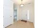Bright entryway with tile flooring, coat closet, and access to other rooms at 3518 Heathcliff Ct, Westfield, IN 46074