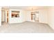 Living room with kitchen views, fireplace, and access to other rooms at 3518 Heathcliff Ct, Westfield, IN 46074