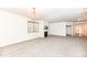 Living room with chandelier, fireplace, and views of entry and dining areas at 3518 Heathcliff Ct, Westfield, IN 46074