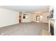 Spacious living room with carpeting, fireplace, and views to kitchen and dining areas at 3518 Heathcliff Ct, Westfield, IN 46074