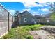 House back view, green siding, yard space at 3616 N College Ave, Indianapolis, IN 46205