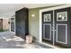 Charming front porch featuring double doors and a brick column at 3616 N College Ave, Indianapolis, IN 46205