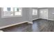 Living room with hardwood floors and neutral gray walls at 3616 N College Ave, Indianapolis, IN 46205