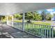 Spacious front porch overlooking a tree-lined street at 3616 N College Ave, Indianapolis, IN 46205