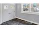 Bright entryway with double doors and hardwood floors at 3616 N College Ave, Indianapolis, IN 46205