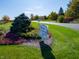 Avon Gardens community entrance with landscaping and signage at 2298 Pine Valley Dr, Plainfield, IN 46168