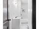 Updated bathroom with white subway tiles and marble floors at 3752 Ruckle St, Indianapolis, IN 46205