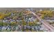 Aerial view of a residential neighborhood showcasing tree-lined streets and homes in autumn at 3752 Ruckle St, Indianapolis, IN 46205