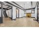 Large living room with hardwood floors, fireplace, and decorative molding at 3752 Ruckle St, Indianapolis, IN 46205