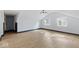 Spacious bonus room with two windows and wood-look flooring at 3752 Ruckle St, Indianapolis, IN 46205