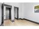 Well-lit bedroom featuring gray doors and wood-look floors at 3752 Ruckle St, Indianapolis, IN 46205