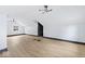 Large bonus room, featuring hardwood floors and recessed lighting at 3752 Ruckle St, Indianapolis, IN 46205