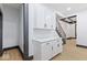 Modern kitchen featuring white shaker cabinets and quartz countertops at 3752 Ruckle St, Indianapolis, IN 46205
