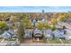 Aerial view showing home and surrounding neighborhood in autumn at 3752 Ruckle St, Indianapolis, IN 46205